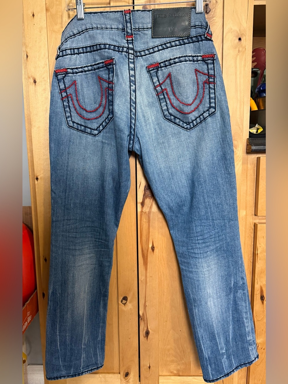 True Religion light blue jeans with red contrast stitching
